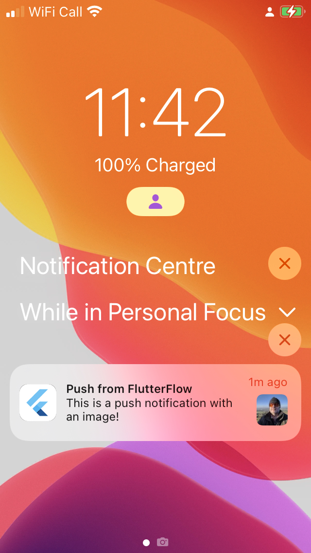 Screenshot of a push notification with an image on an iPhone