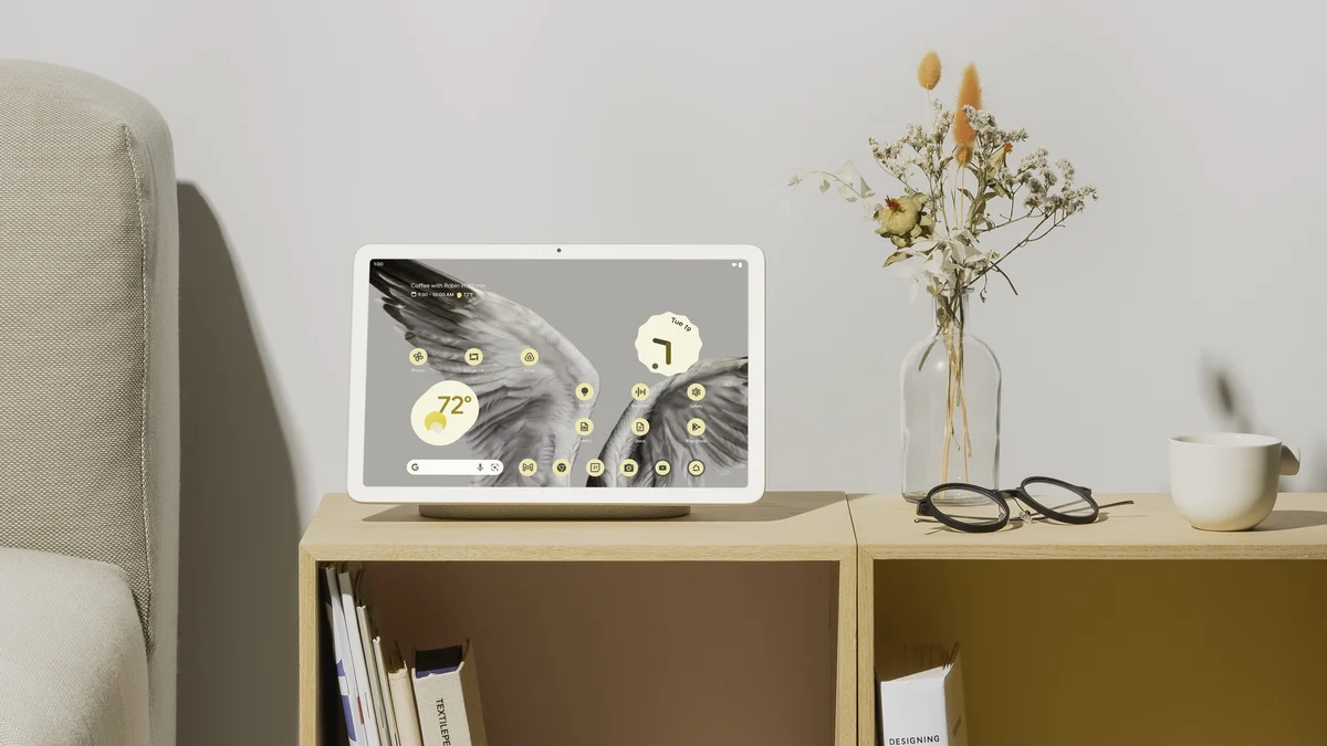 Google Pixel Tablet on a stand in a living room (Source: https://blog.google/products/pixel/26-helpful-pixel-tablet-tips-and-features/)