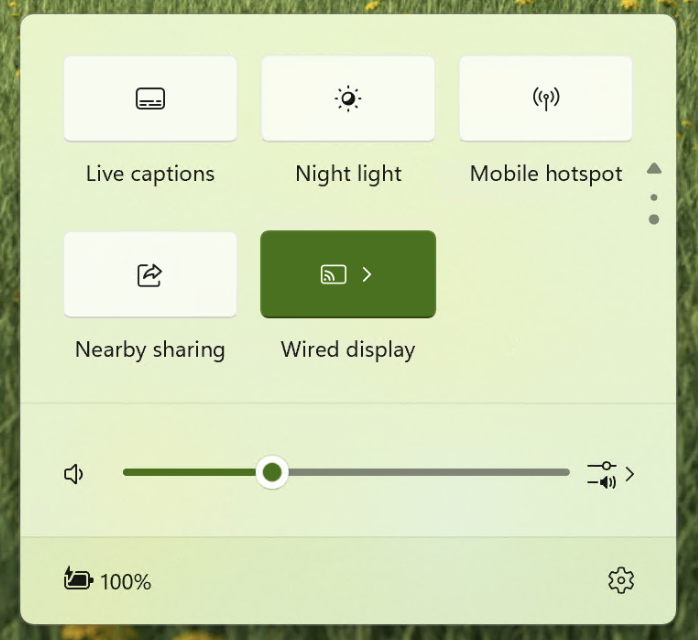 Screenshot of Windows 11 24H2 System Tray - showing live captions button